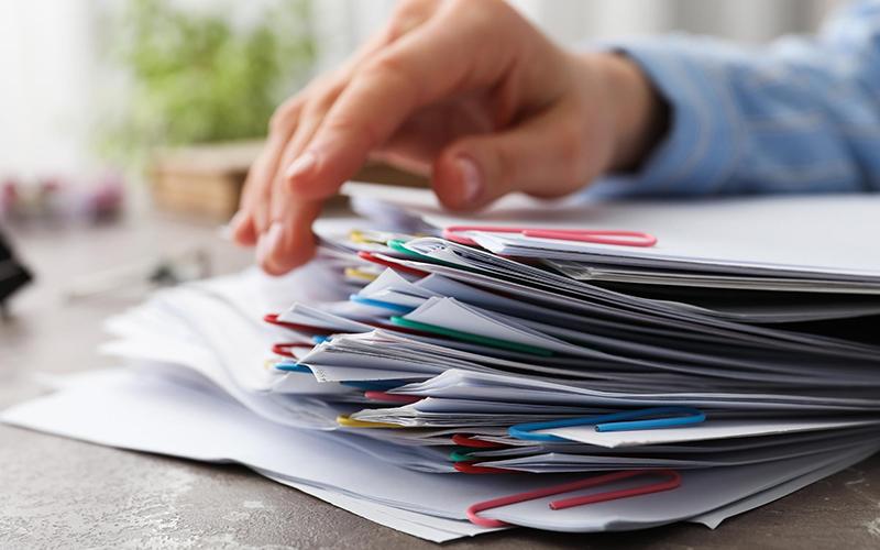 Future Medical Cost Screening Checking _ Sorting through documents